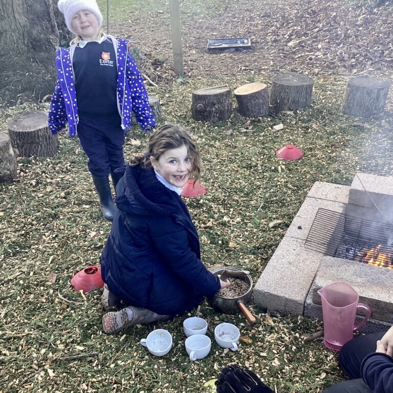 students by a fire