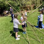 student building a den