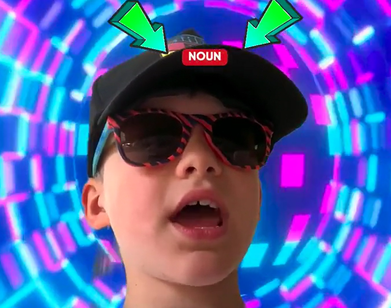 boy with a noun hat on