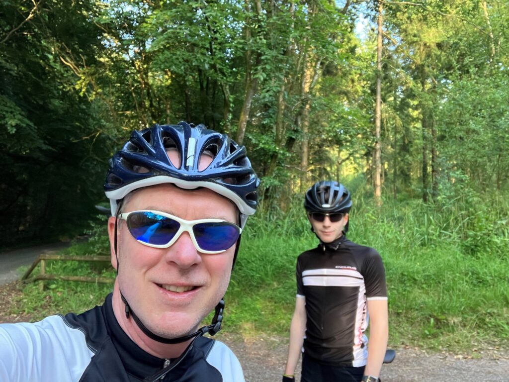 selfie of two people wearing cycling gear