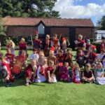 group of children dressed up for roman day